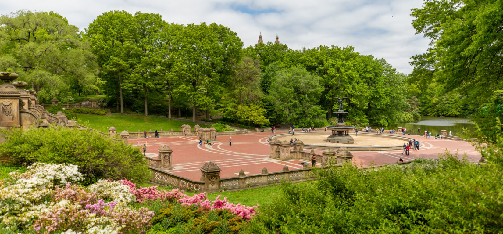 Bethesda Terrace embedded in the lush green foliage of summer