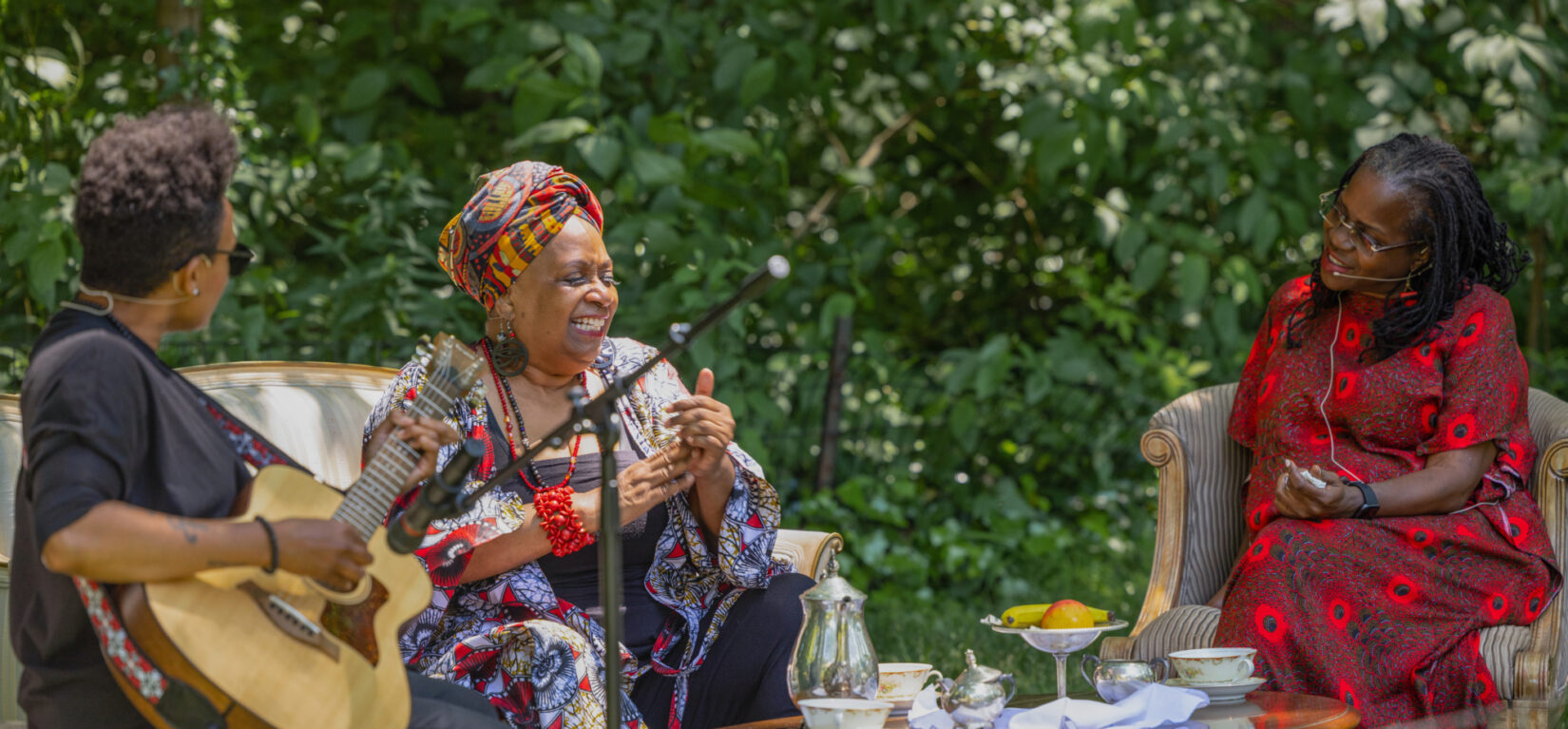 Three performers in the Seneca Village landscape in Central Park.