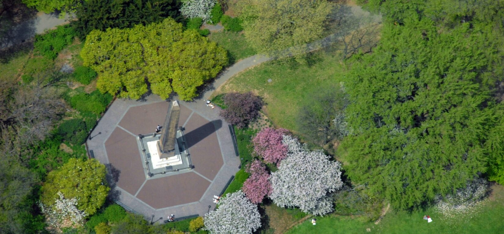 An aerial view of the Obelisk and surrounding landscape, taken in summer.