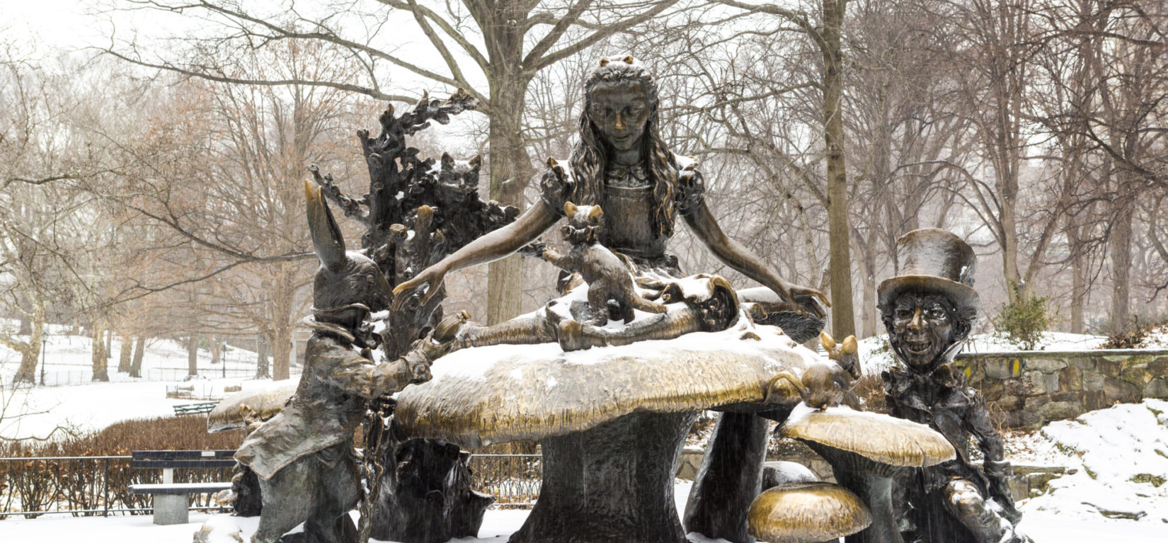 The Alice in Wonderland statue, depicted with winter snow