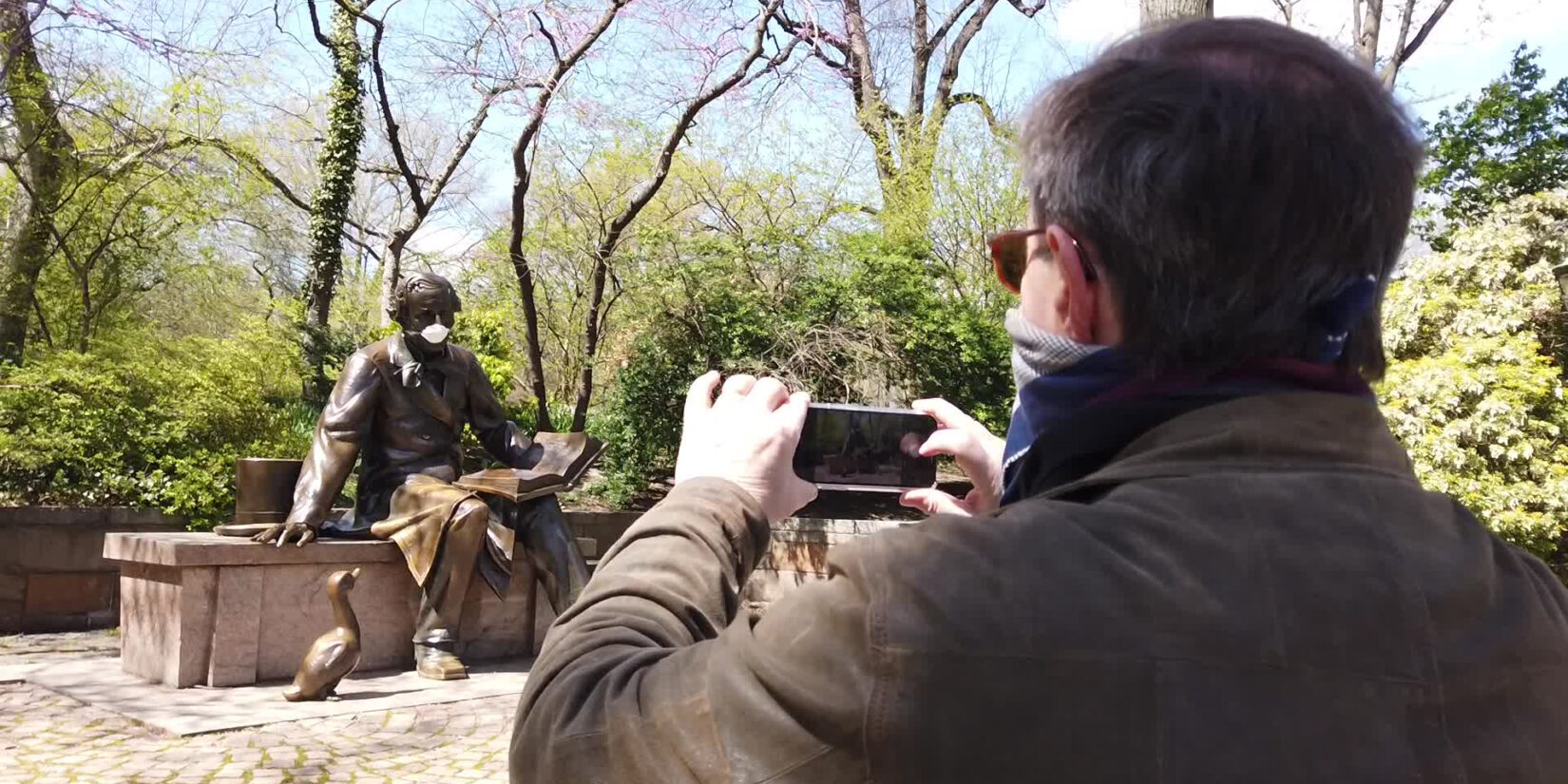 Mason photographing the Andersen statue by Conservatory Water