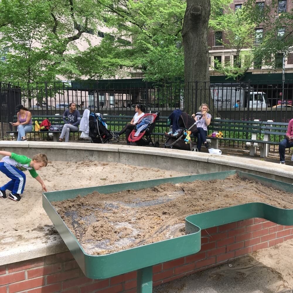 The sand table is a self-contained tier above the larger sand feature.