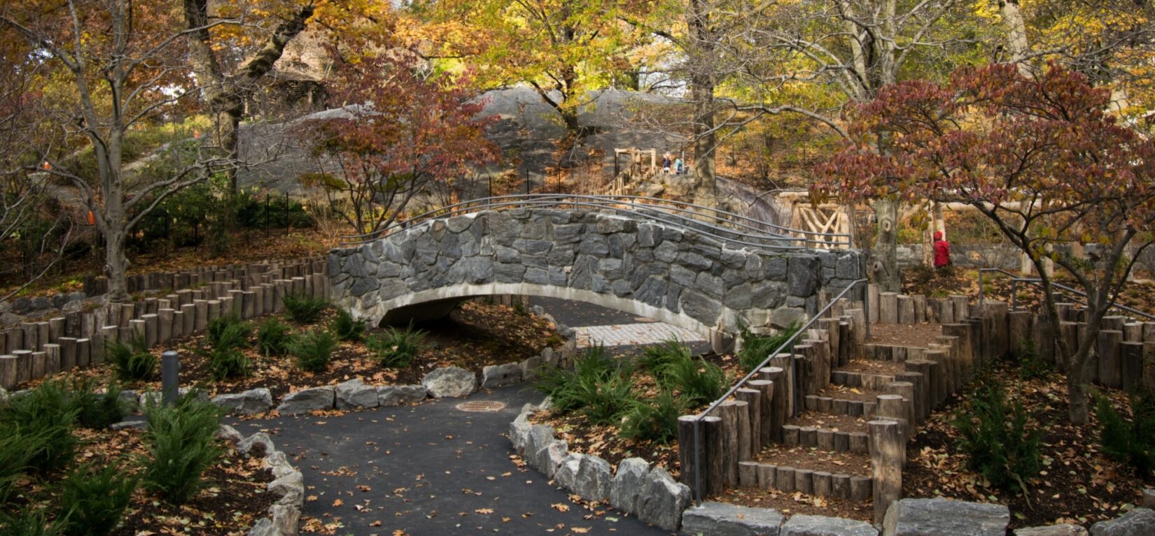 The playground is beautifully integrated into its Park setting