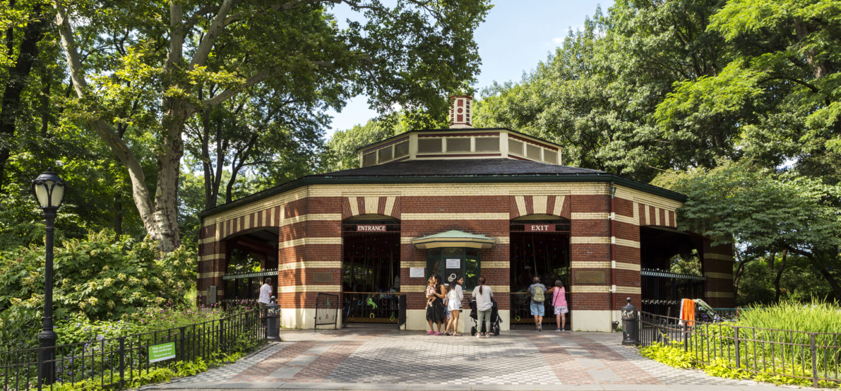 The facade of the Carousel features cream stripes in the brickwork