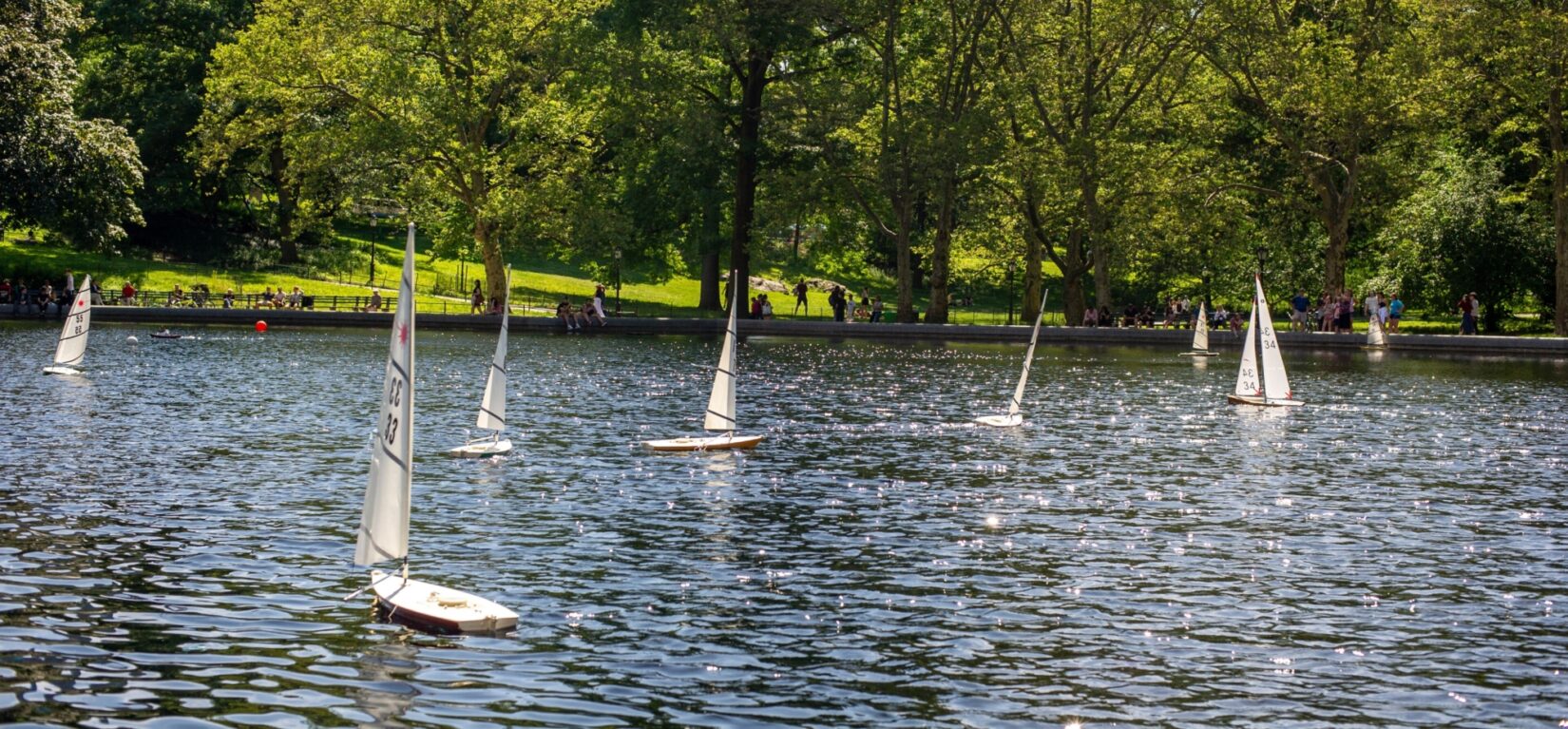 Model sailboats dance on the surface of Conservatory Water