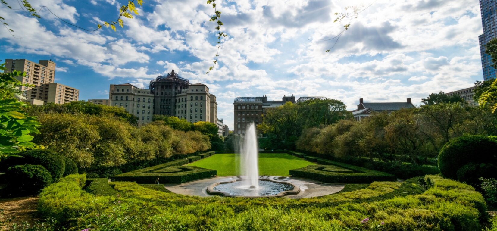 A fish-eye view of the fountain, shot from the pergola facing east to the buildings on Fifth Avenue