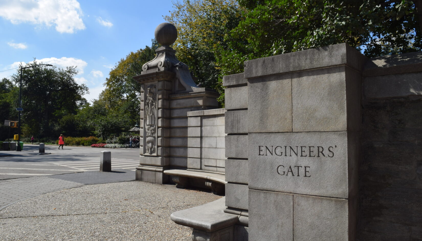 A view of Engineers' Gate in Summer showing blocks of curved stonework