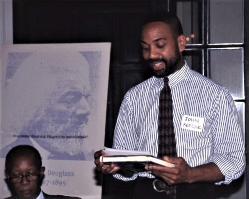 Photo of Howard Dodson in shirtsleeves and a tie