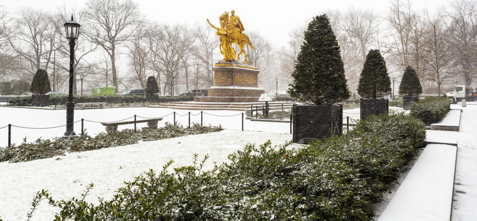 The statue of General Sherman is the focal point of Grand Army Plaza dusted with snow