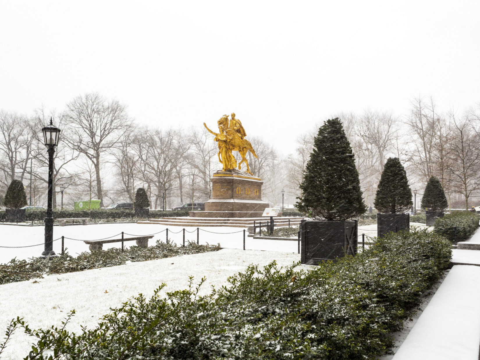 The statue of General Sherman is the focal point of Grand Army Plaza dusted with snow