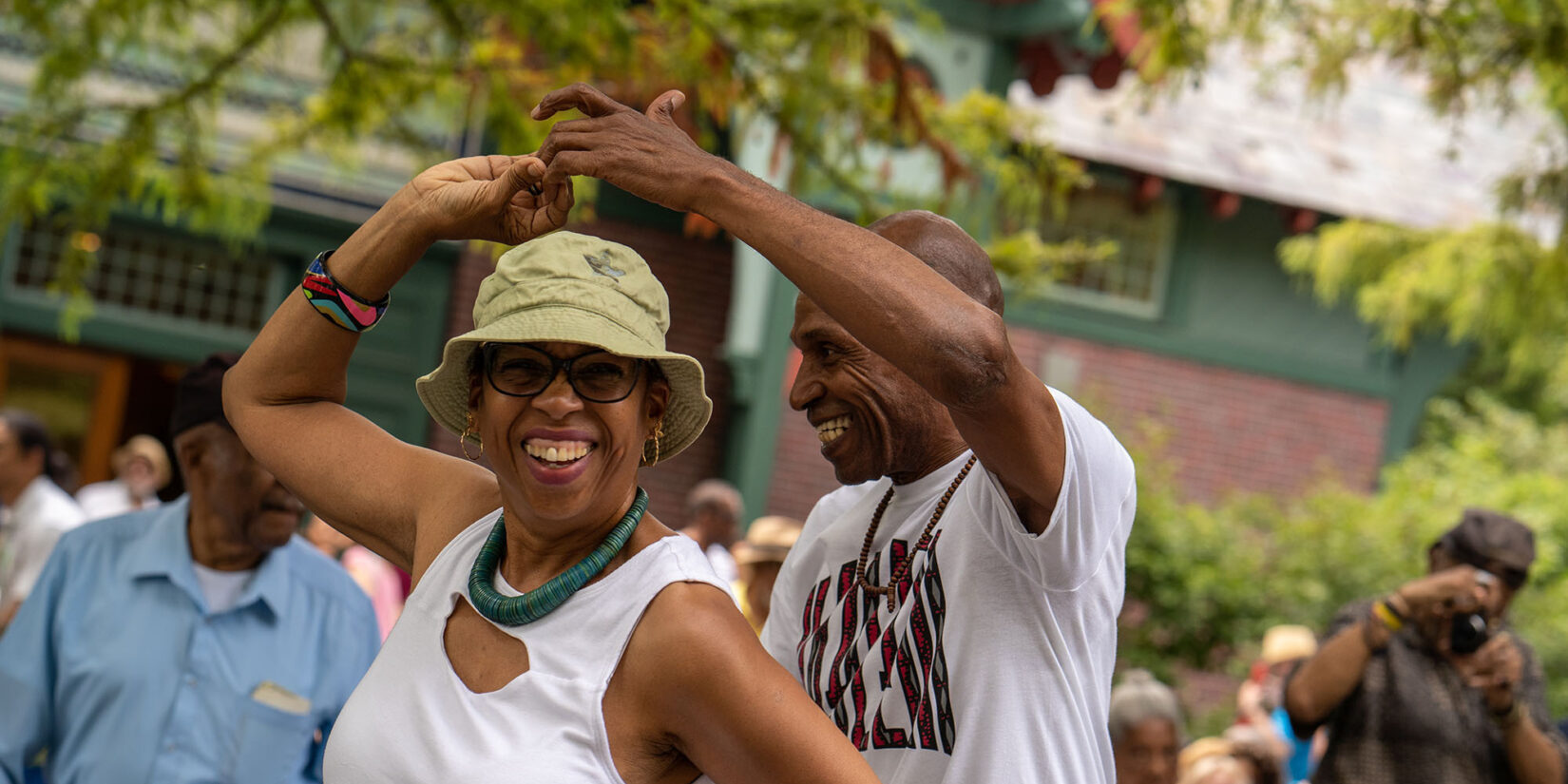 Two older dancers enjoying the rhythms of the festival