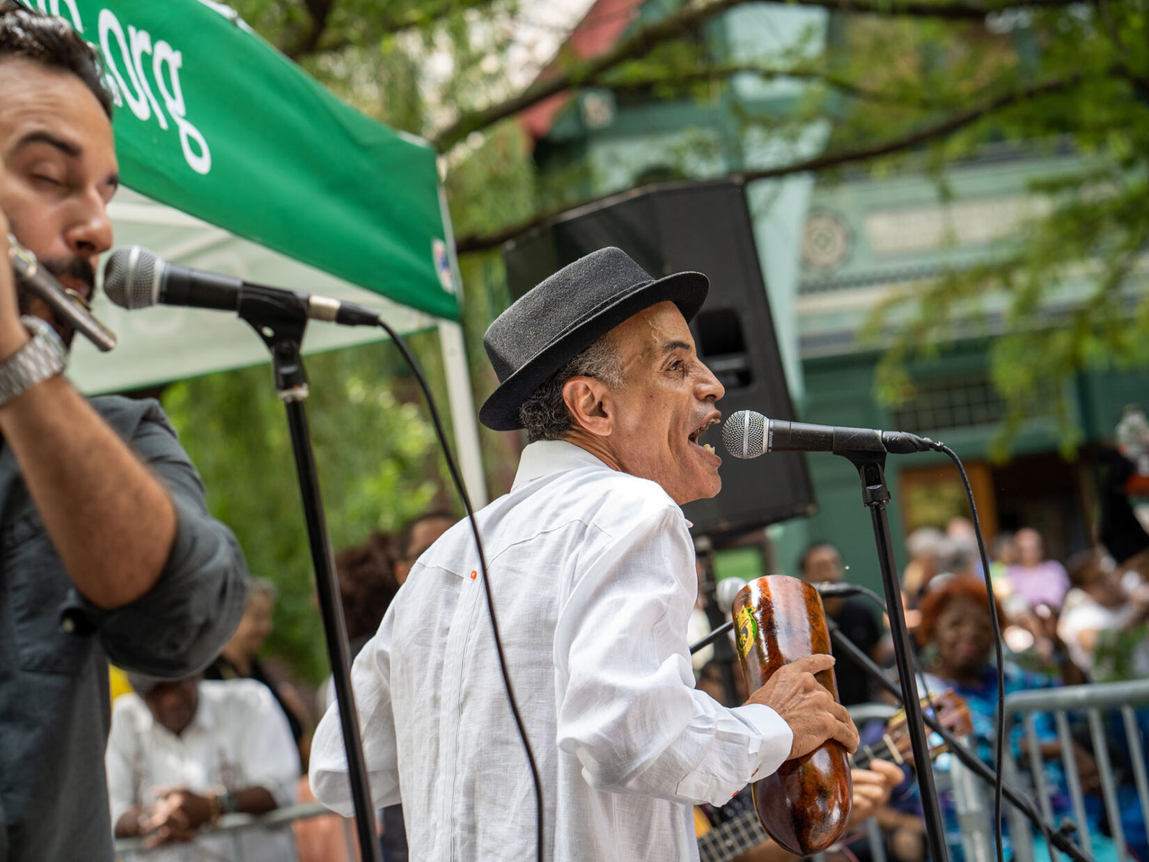 Performers with an accordion and a flute entertain at the festival