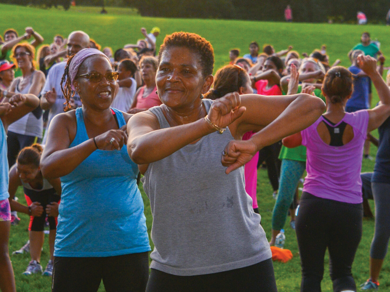 A group of people doing a fitness class in Central Park