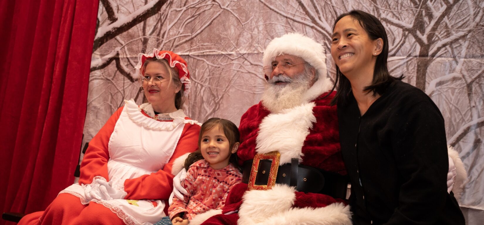 Unidentified couple from the North Pole pose with Park visitors