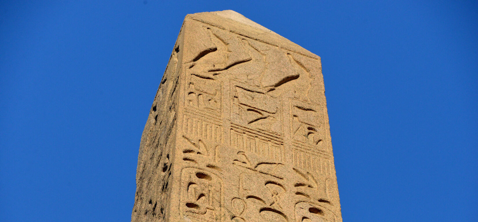 A detail view of the top of the Obelisk, showing heiroglyphs in relief