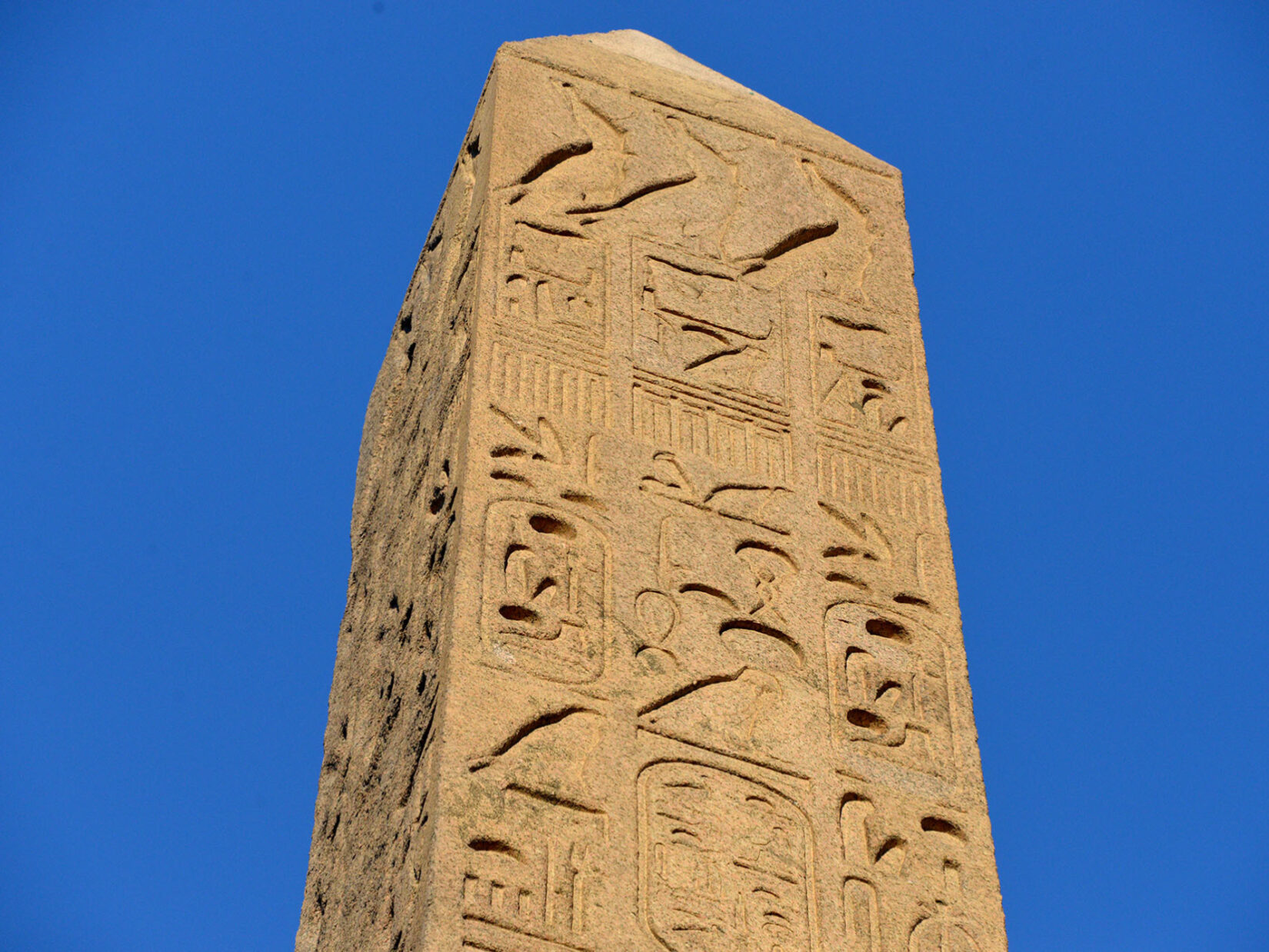 A detail view of the top of the Obelisk, showing heiroglyphs in relief