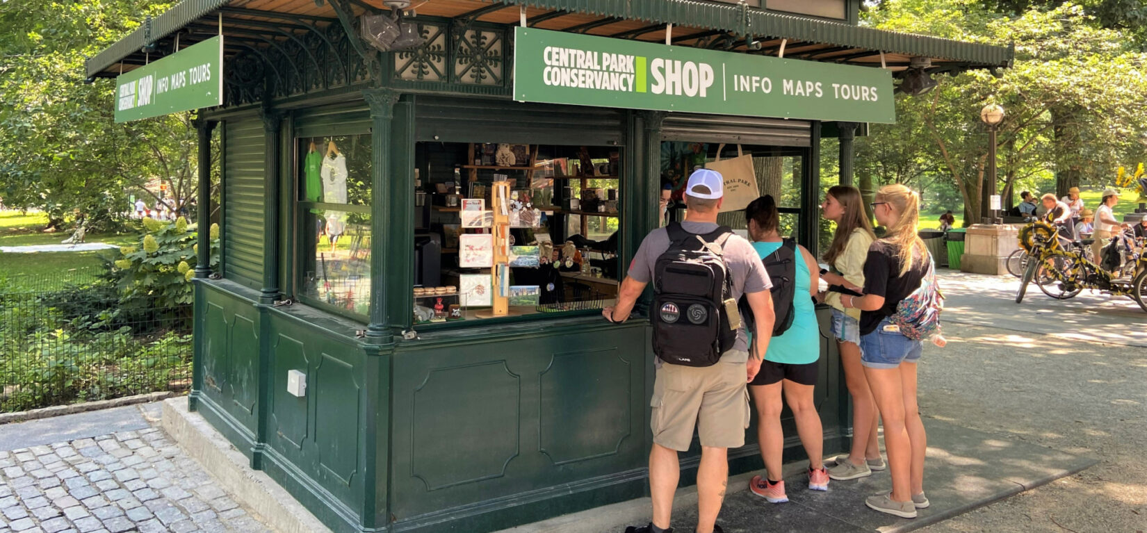 Visitors at the Columbus Circle Information Kiosk during July 2022.