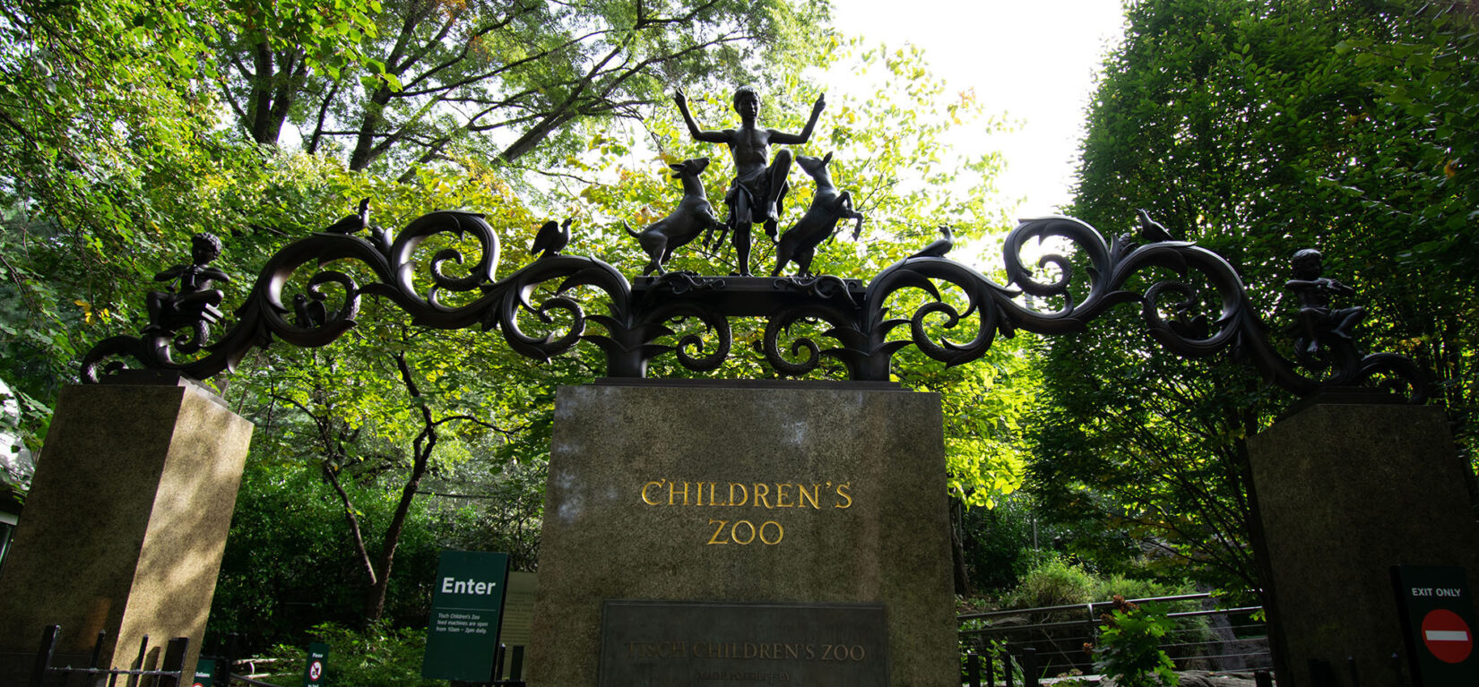 Looking up at the Lehman Gates, highlighting the detail of the ironwork