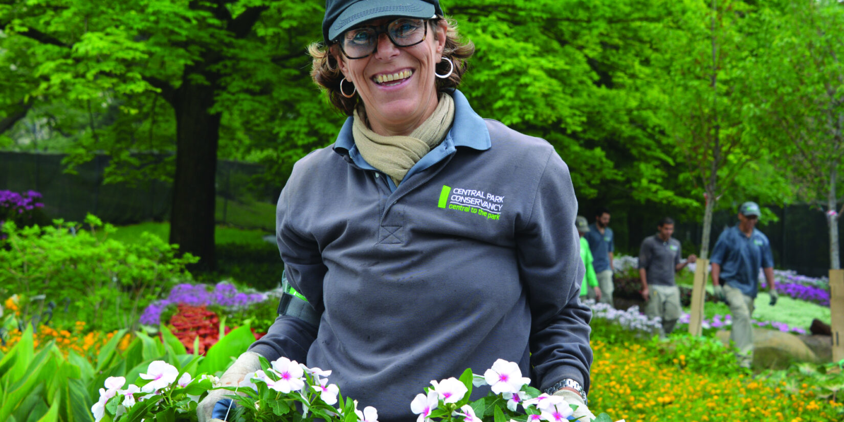 Serena, volunteering in the Park, ready to tend to the flower beds.