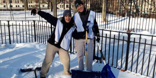 Martha and Serena posing with shovels in a snowy Central Park.