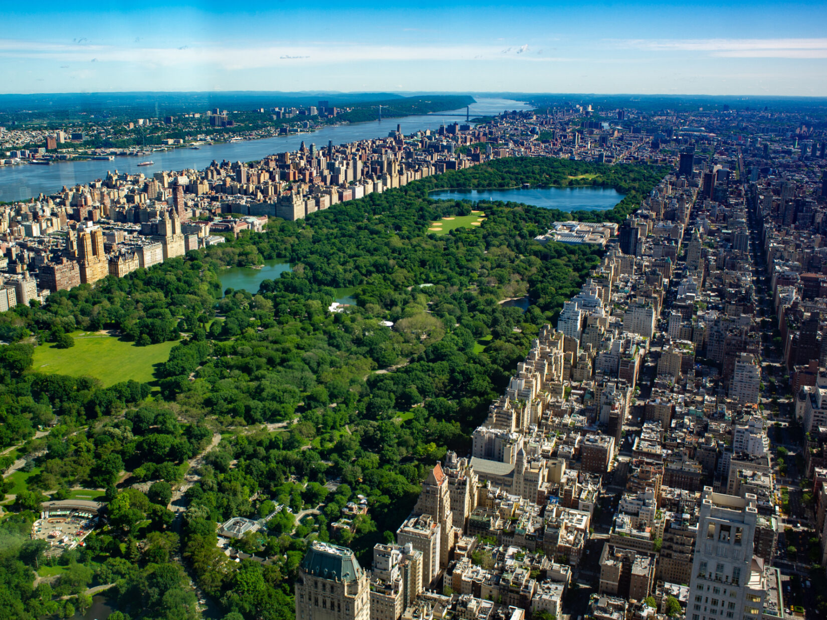 An aerial view of the park showing it's full length, looking north toward Harlem.