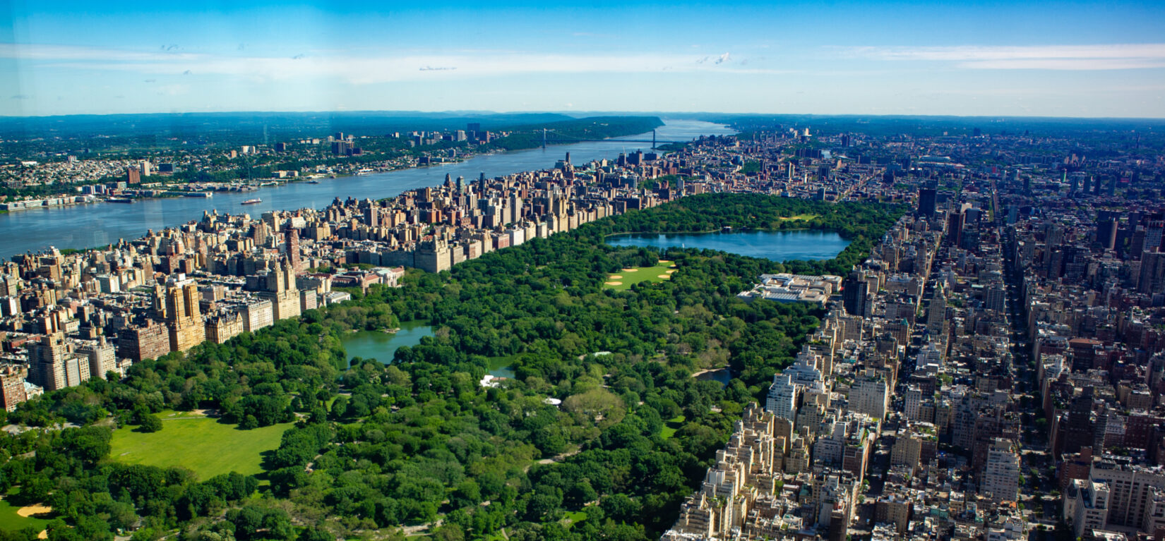 An aerial view of the park showing it's full length, looking north toward Harlem.