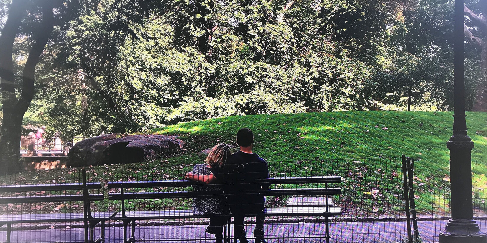 Phil Rosenthal and wife sitting on a Central Park bench