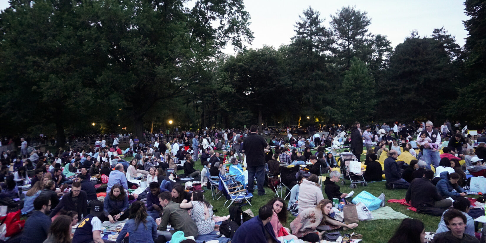 Concertgoers gather for a 2019 New York Philharmonic Concert in Central Park