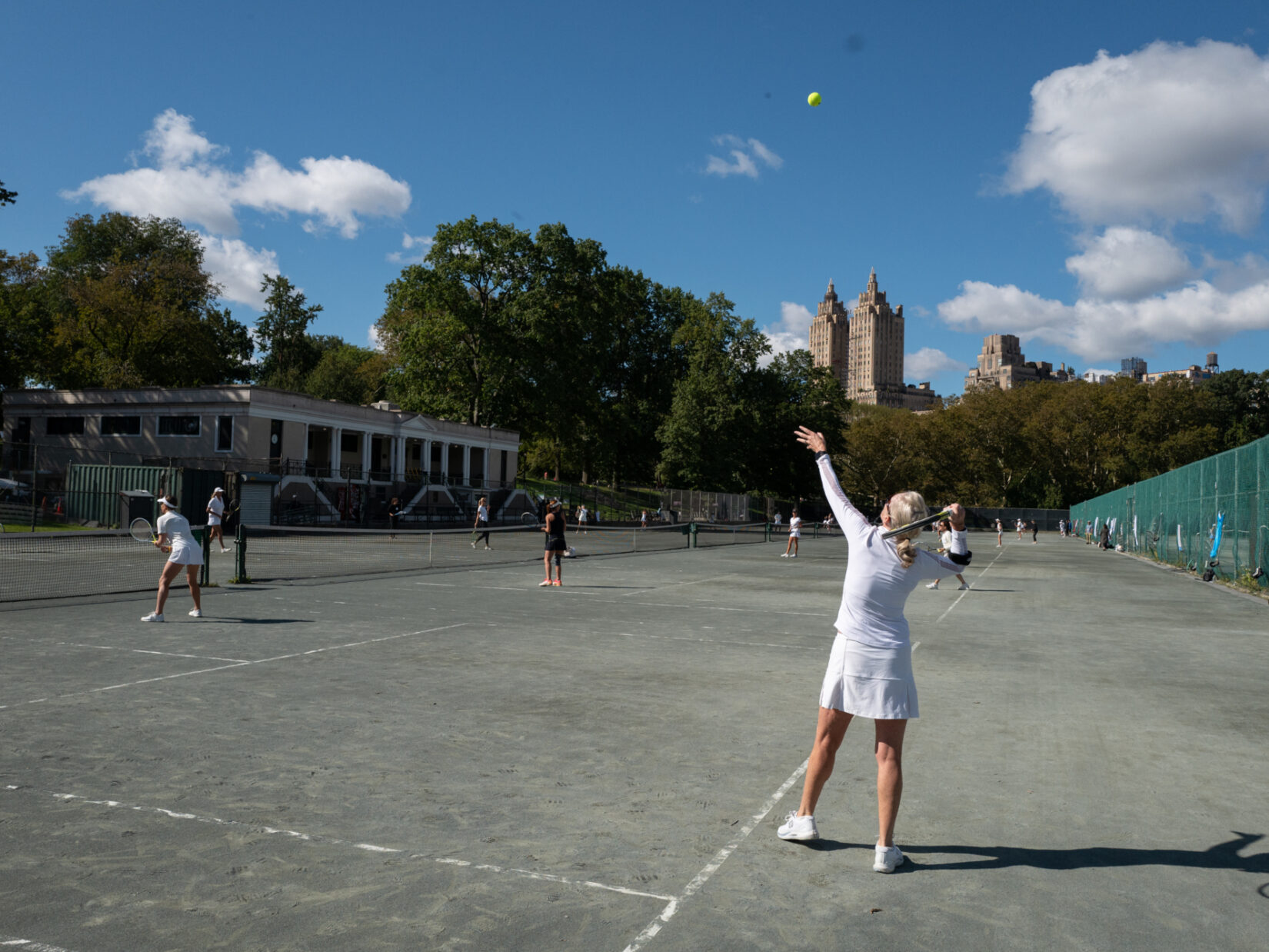 People playing tennis in Central Park