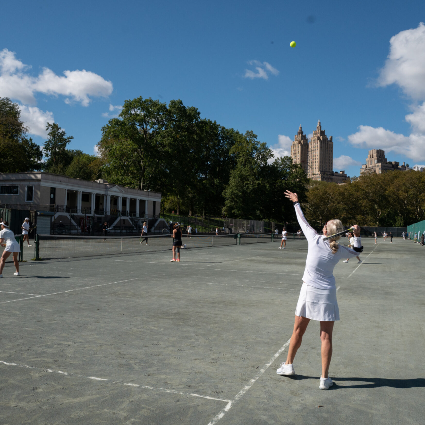 People playing tennis in Central Park