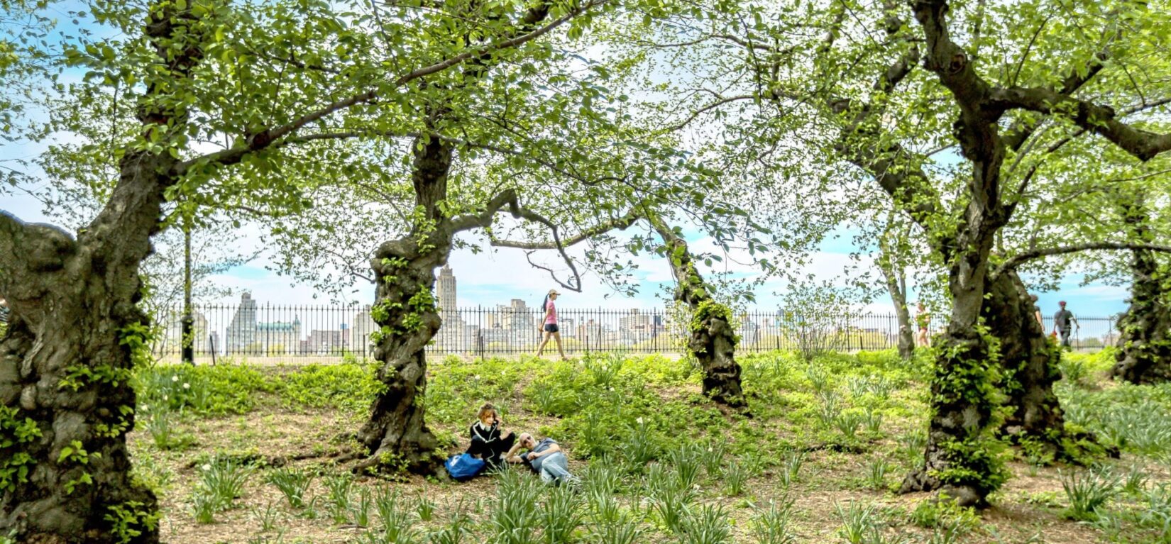 A couple lounge below the running track at the Reservoir.