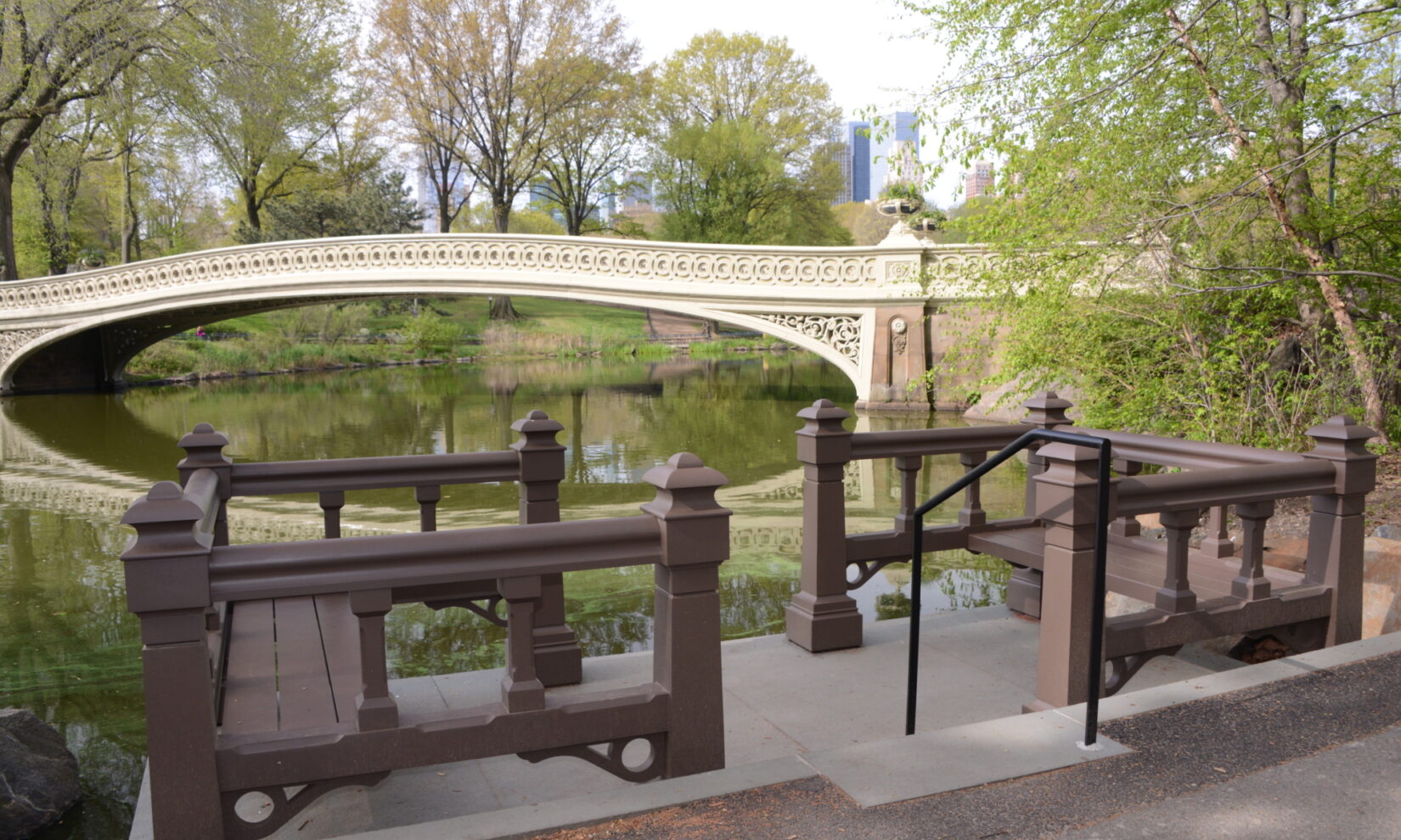 Bow Bridge is seen across the Lake from the landing in spring.