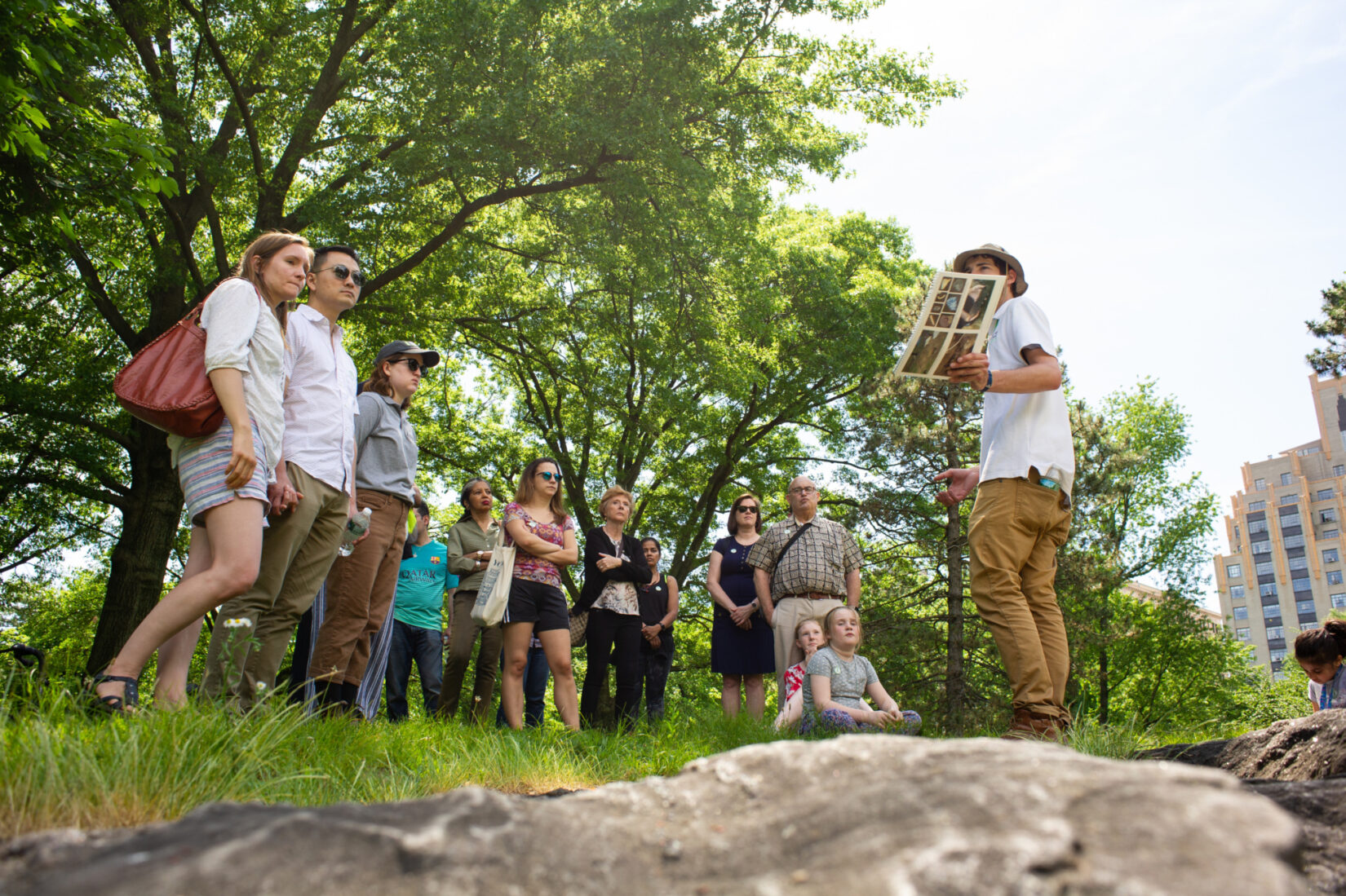 A Conservancy guide leads park goers on a tour of Seneca Village