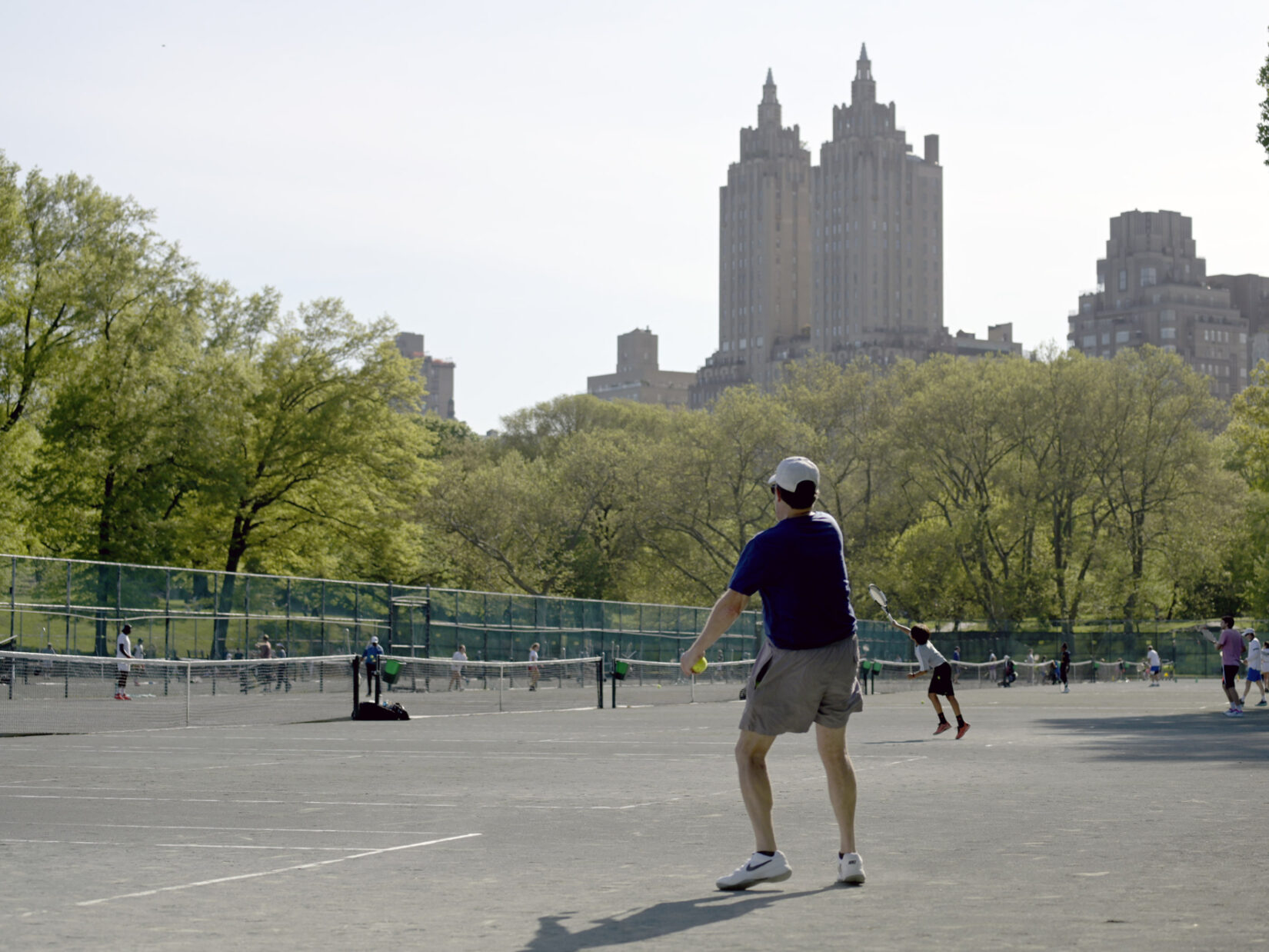 Players at the Central Park Tennis Center