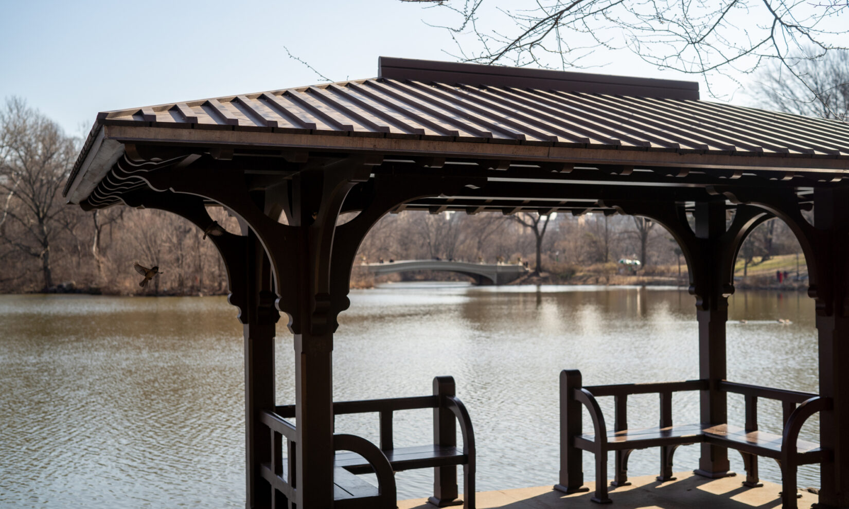 Bow Bridge can be seen in the distance through the structure of the landing.